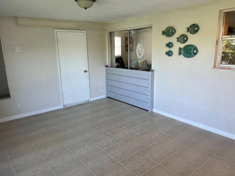 Patio ding door flood barrier system